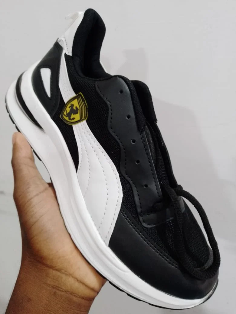 black-white_ferrari_puma_men'_classic_fashion_sneaker_2.webp