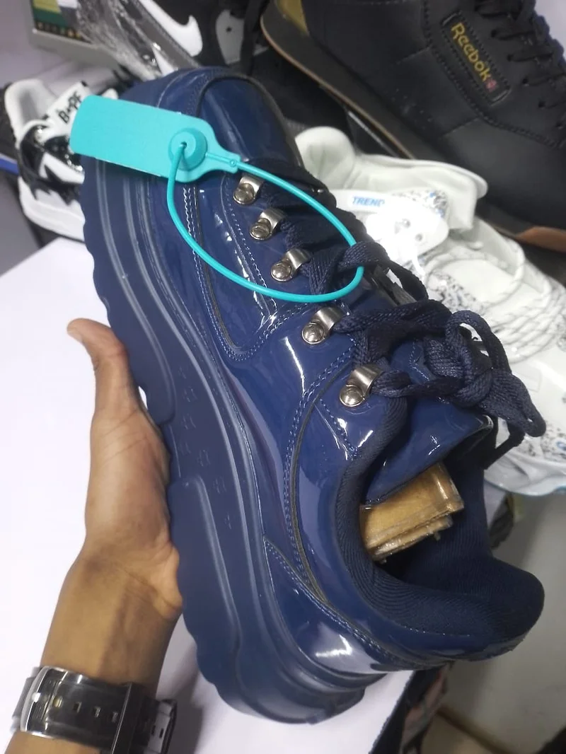 blue_quality_original_naked_wolfe_unisex_sneakers_2.webp