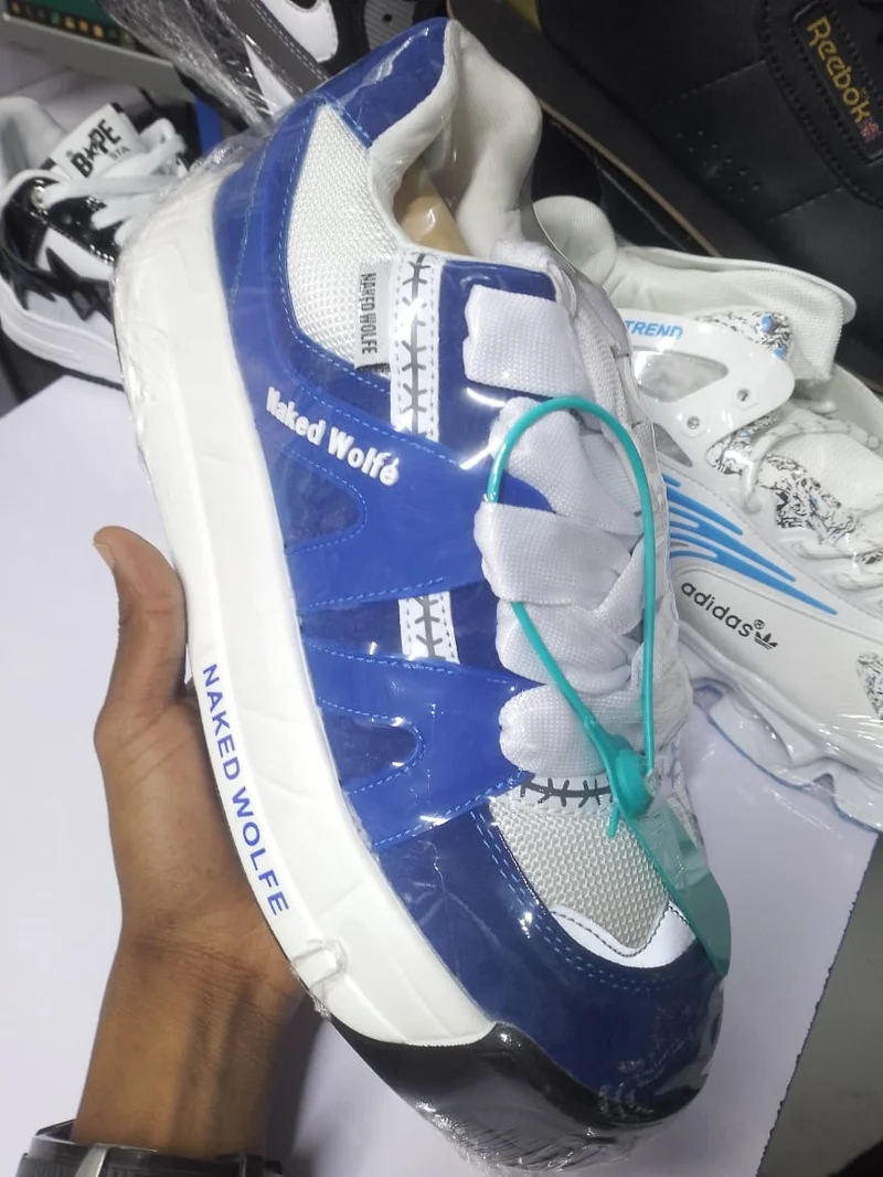 blue_white_quality_original_naked_wolfe_unisex_sneakers_2.webp