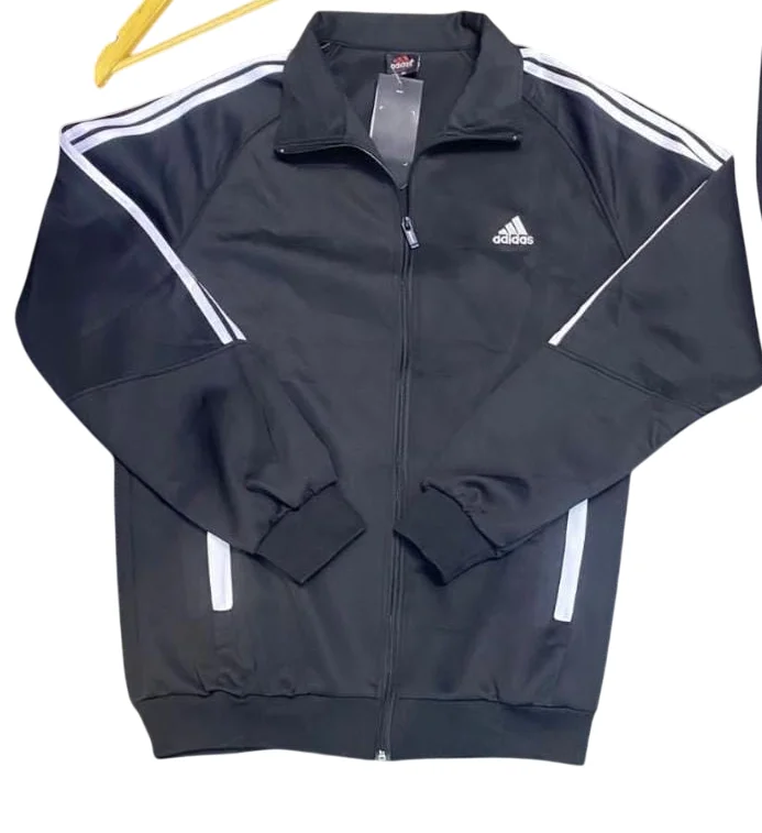 designer_unisex_adidas_tracksuit_jacket_and_pants_in_black_and_white._2.webp