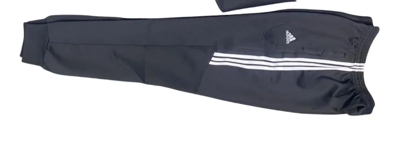 designer_unisex_adidas_tracksuit_jacket_and_pants_in_black_and_white._3.webp