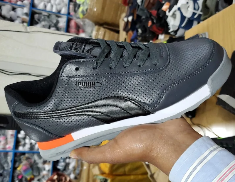 grey-black_leather_puma_jogger_sneakers_white_sports_shoe_2.webp
