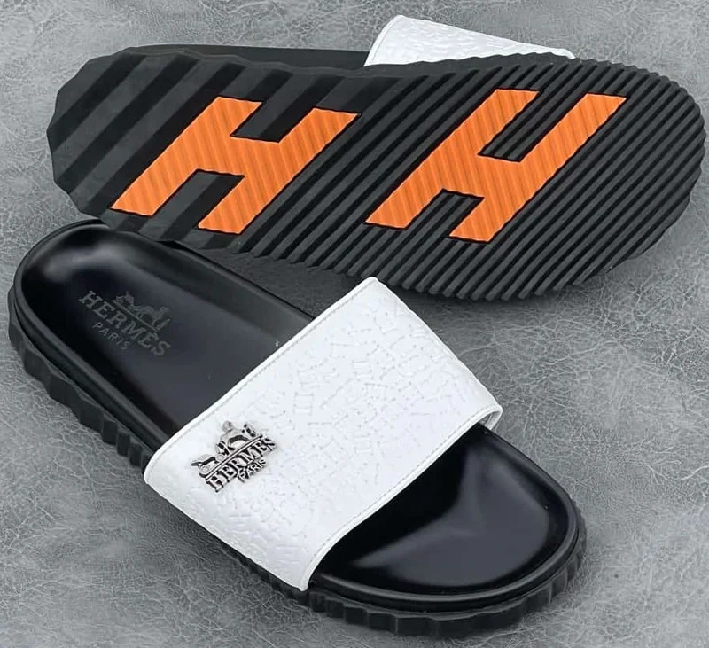 hermès_slide_sandals_-_black_and_white_2.webp