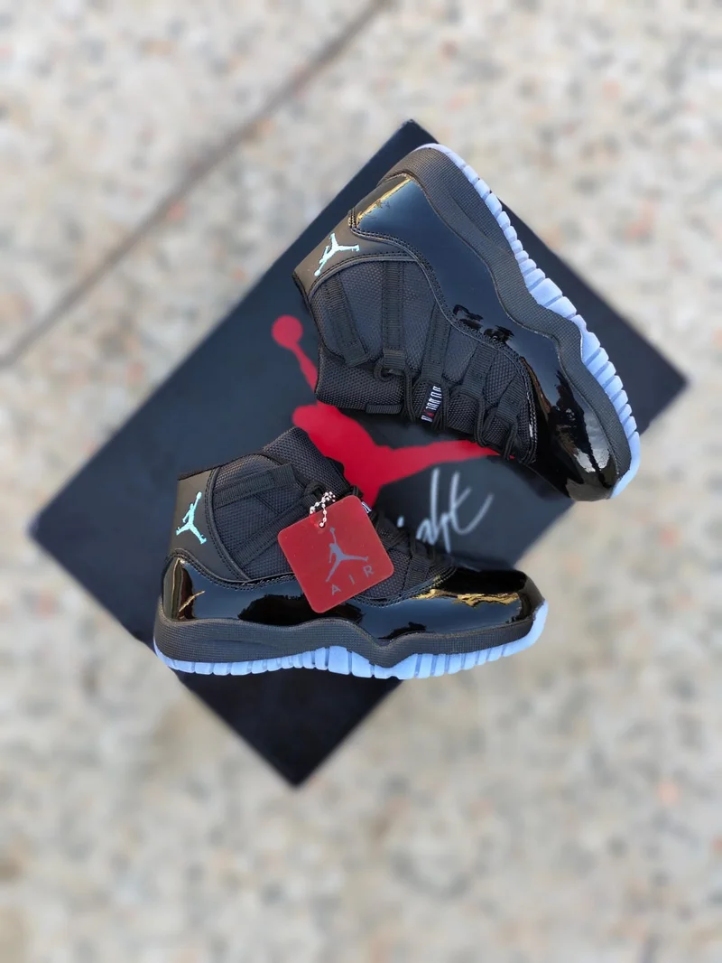 kids_air_jordan_11_low_“black_university_blue”_2.webp