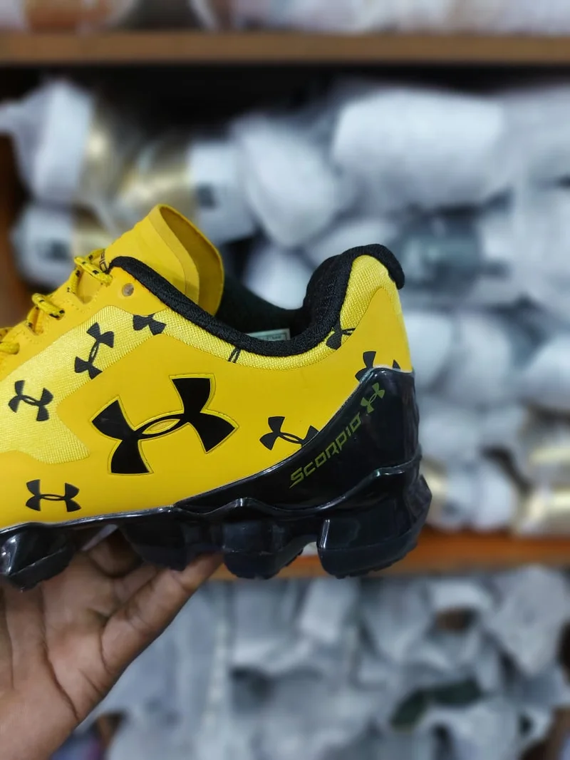 mustard_new_under_x_armours_men's_scorpio__running_shoes_2.webp