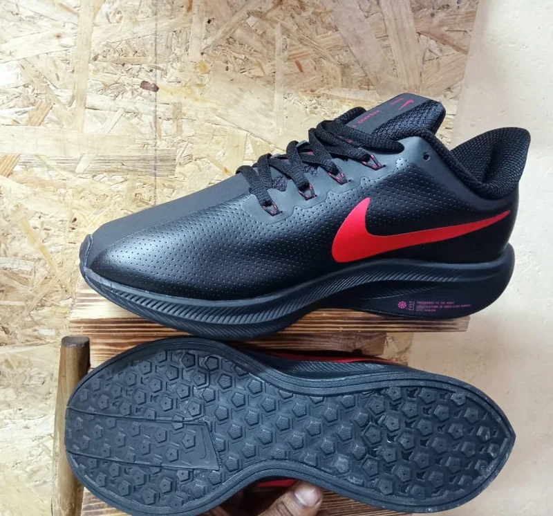nike__zoomx_running_shoes_black_red_2.webp