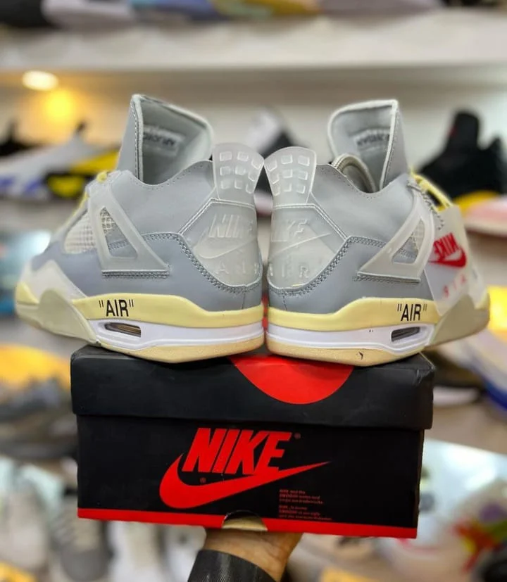 nike_air_jordan_4_cool_grey__yellow_sneakers_2.webp