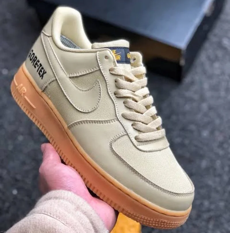 air_force_1_low_gore-text_team_gold_sneakers_2.webp