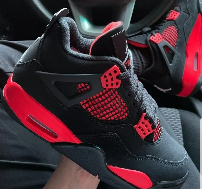 air_jordan_4_red_thunder_sneakers_2.webp