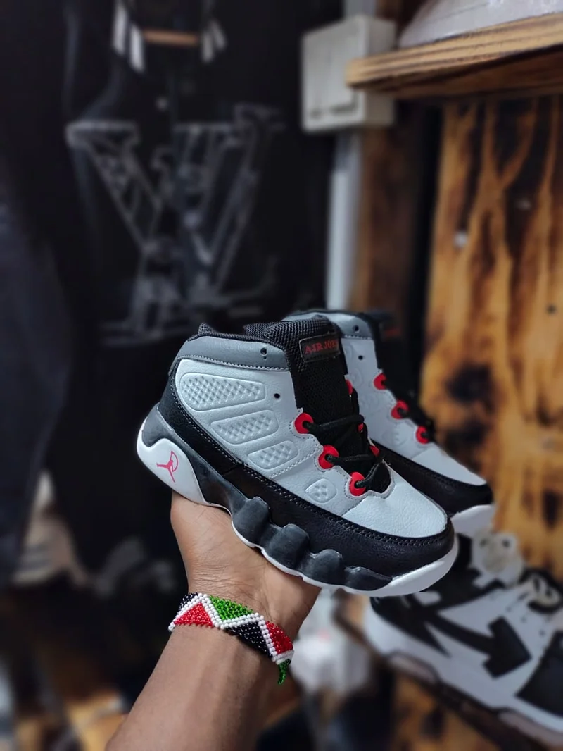 air_jordan_9_kids_retro_black_and_white_sneakers_2.webp