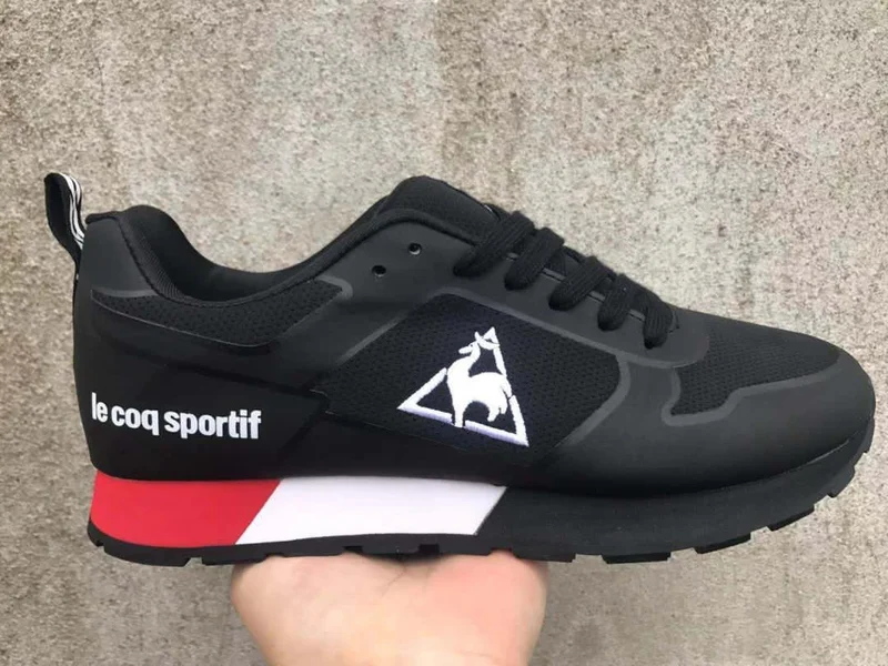 athletic_le_coq_sportif_low_cut_sneakers_-black_and_white_2.webp