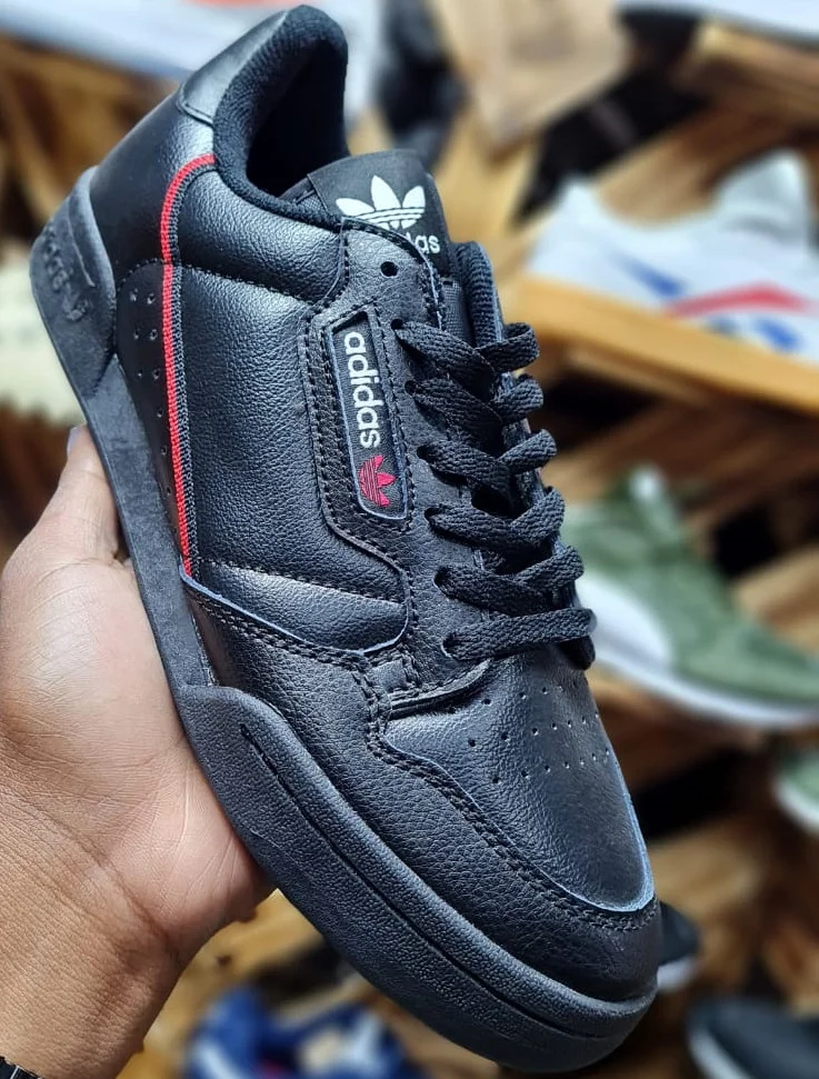black_adidas_sports_men_and_women_sneakers_shoes_2.webp