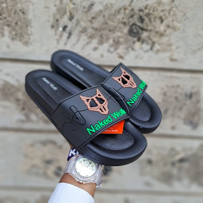 black_and_green_quality_original_naked_wolfe_unisex_slides_2.webp