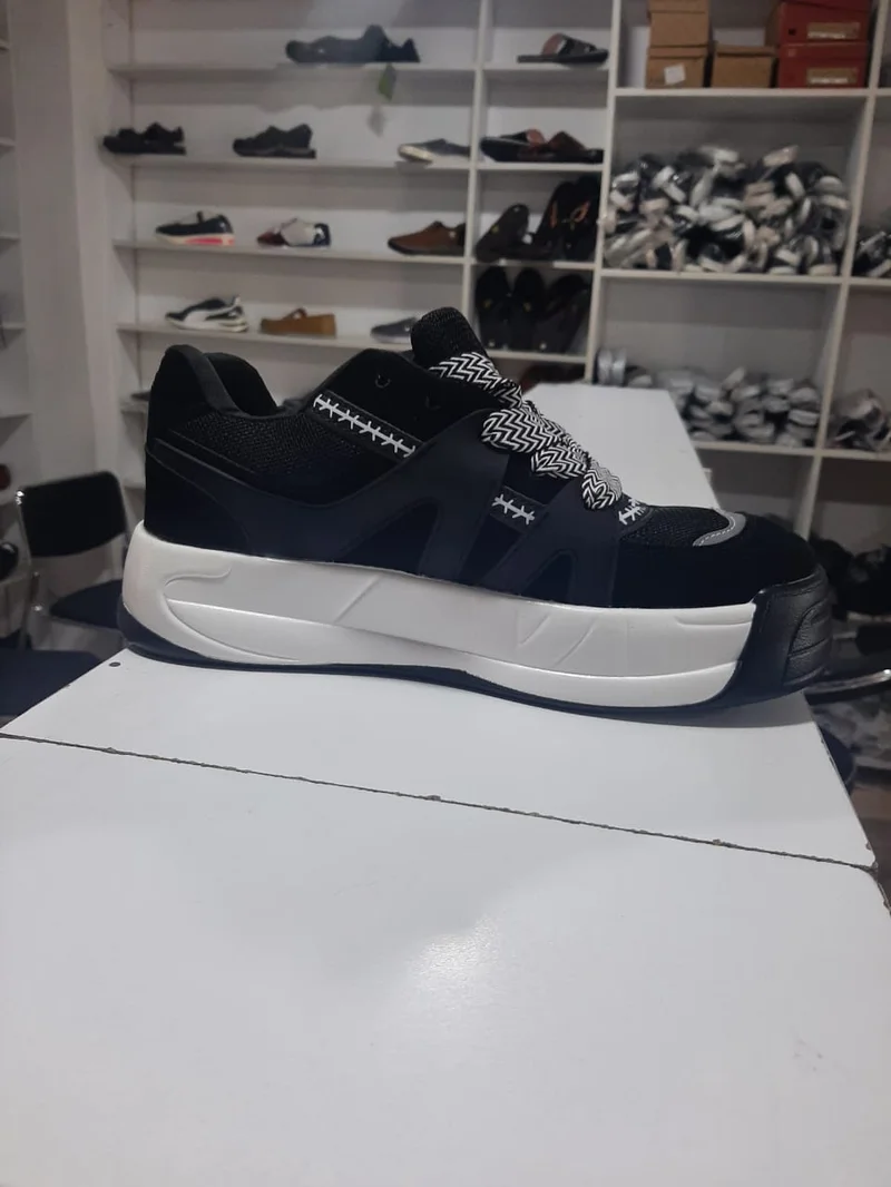 black_and_white_quality_original_naked_wolfe_unisex_sneakers_2.webp