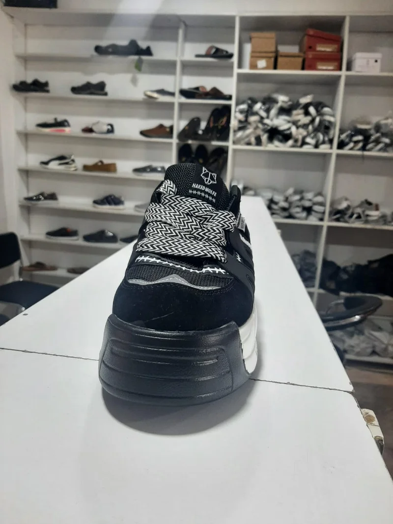 black_and_white_quality_original_naked_wolfe_unisex_sneakers_4.webp