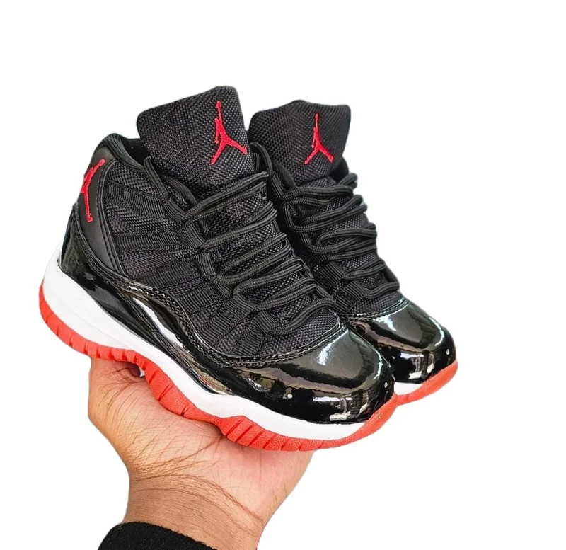 black_kid’s_nike_jordan_11_retro_basketball_shoes_2.webp