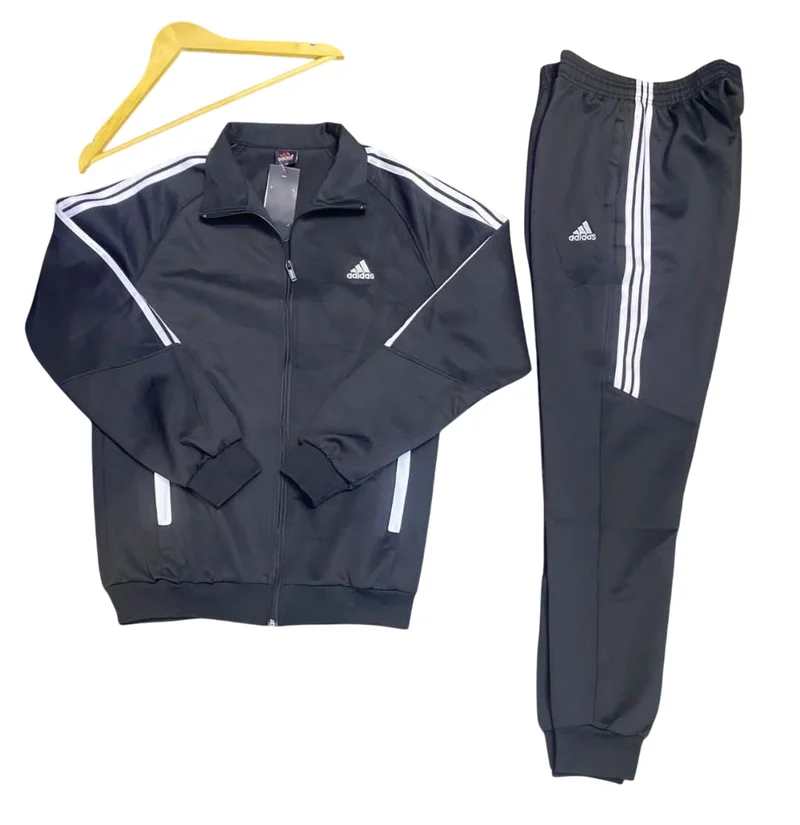 Designer Unisex Adidas Tracksuit Jacket and pants in Black and White.