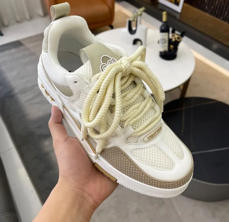 Louis Vuitton LV Trainers Laced Up Sneakers In Cream and White