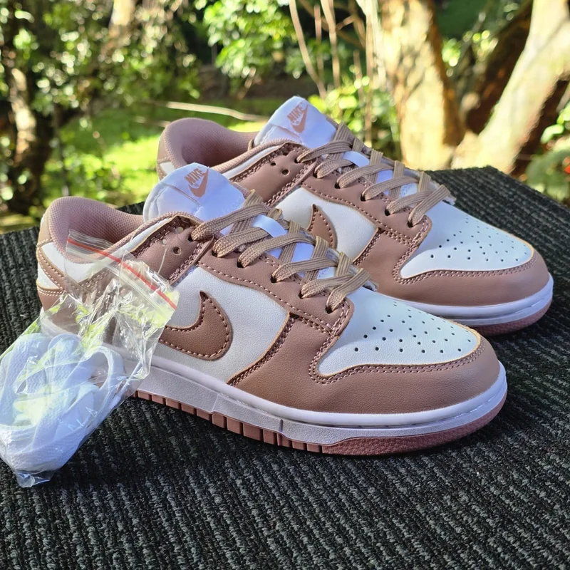Nike SB Dunk Rose Whispers sneakers.