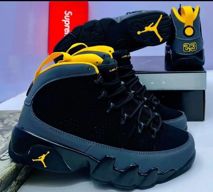 Air Jordan 9 University Gold Sneakers