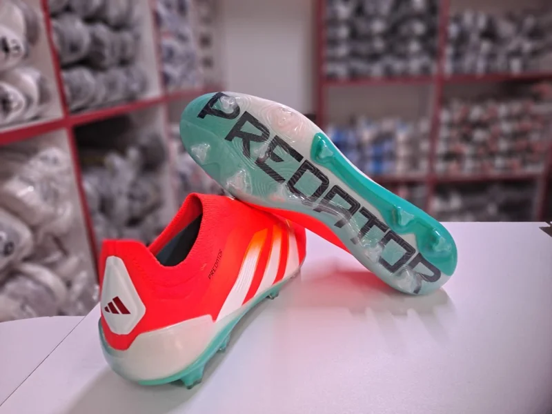 ATHLETES ADIDAS SOCCER SHOES.