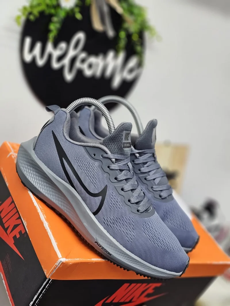 Authentic Grey Nike Air Zoom Pegasus 39 running shoes.