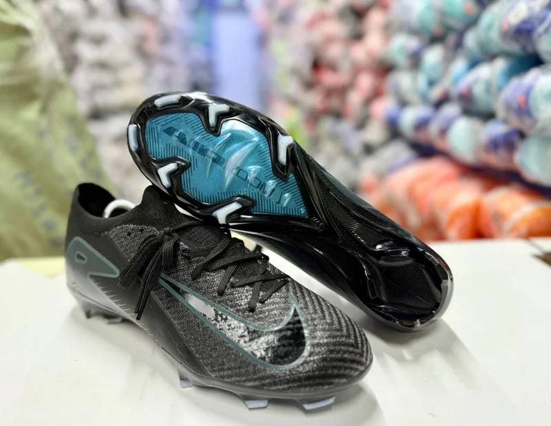 BLACK -GREY NIKE UNITED  MEN’S MERCURIAL VAPOR FOOTBALL SHOES.